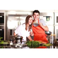 Teambuilding-Kochkurs Münster - Frau und Mann kochen